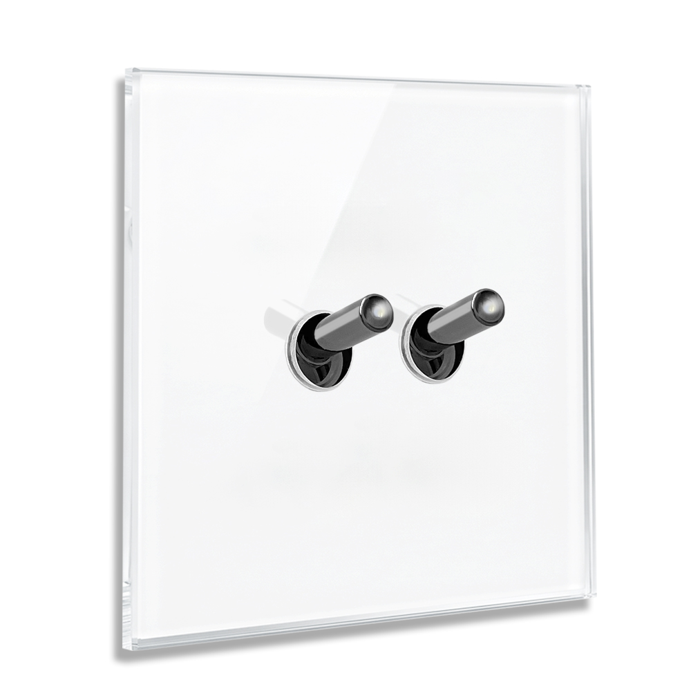 Modern illuminated design light switch in white glass optic with 2 chrome toggle levers. YORK