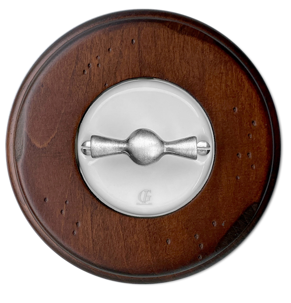 Retro porcelain light switch with "Butterfly" rotary switch and walnut frame. VDE certified. German standard
